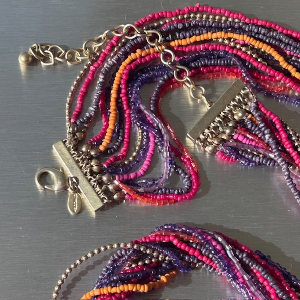 Multi-strand beaded necklace with small beads in vibrant colors